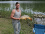 Amateur Adam Sacco poses with his 13 lb, 2 oz Common.