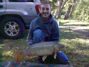 Chris West with a 15 lb 4 oz Common caught at Lion's Community Park in Baldwinsville