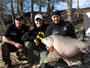 (from left) Mihai Aciu, Jason Bernhardt and Bogdan Bucur celebrate the catch and release of the record-setting Buffalo Bob. Lake Fork, TX