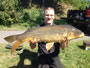 Jamie Godkin with a 16.9 lb common from Session 1 in Fulton, NY.