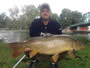 Rick Greenier with a 24.6 lb common carp caught during Session 2 in Liverpool, NY.