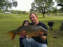 Steve Bailey with an 18.2 lb common caught during Session 2.