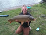 Jamie Godkin with an 18.13 lb common carp caught during Session 3 in Fulton, NY.