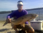 Minh Le with a 20+ lb grass carp caught during Session 4 of the Wild Carp Club of Houston.