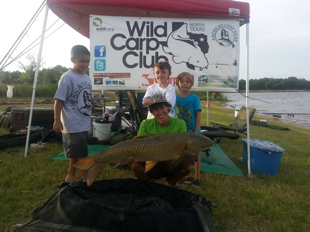 Austin Anderson with a 22.0 lb grass carp caught during session 5 of the Wild Carp Club of North Texas