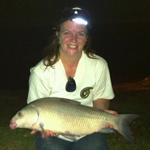 Laura Deatherage with her first ever smallmouth buffalo caught during session 3 of the Wild Carp Club f North Texas