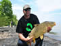 7-Jamie Kinslow with a 14.15 lb common caught during session 1 of the Wild Carp Club of Ontario.