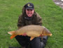 Jason Bernhardt with his first catch of the Spring 2011 Wild Carp CLub season--a 19 lb, 14 oz Common.