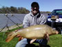 Kent Appleby poses with a 24lb, 15oz common carp caught during Session 6 of Wild Carp Club of Central NY.