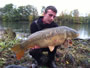 Sean Lehrer with a mirror carp caught during day 2. This was not larger than the previous big mirror.