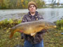 Matt Delosh with a 21.10 lb common, helping peg 1 improve its Big 4 weight.