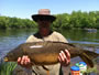 Eric Ames (peg 1) with the Wild Carp Classic's first mirror carp, 18.15 lb.