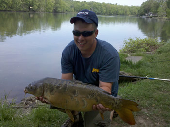 Jason Bernhardt with a 15 lb Mirror Carp