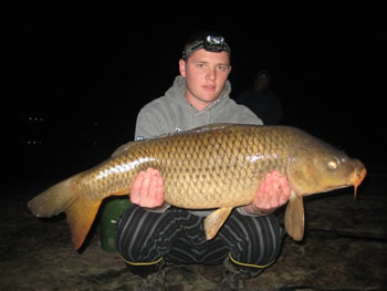 Nick Davis with a 26+ lb common carp caught in Houston, TX